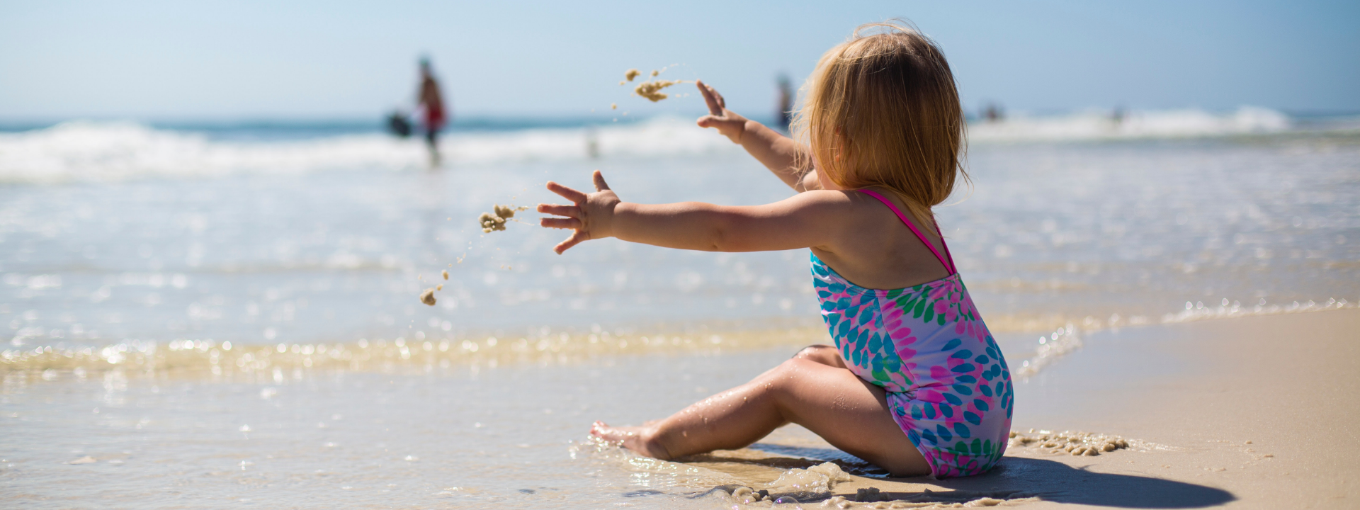 Photo by Ashley K Bowen from Pexels: https://www.pexels.com/photo/toddler-girl-sitting-on-shore-during-day-1712855/